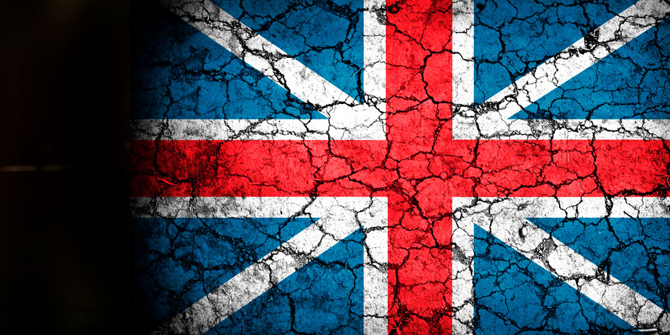 the Union Flag with a cracked effect as if it were broken tarmac