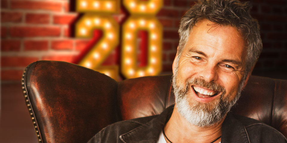 24/7 prayer movement founder Pete Greig sat in a chair as he is interviewed