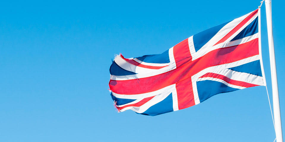 union flag flying against a blue sky