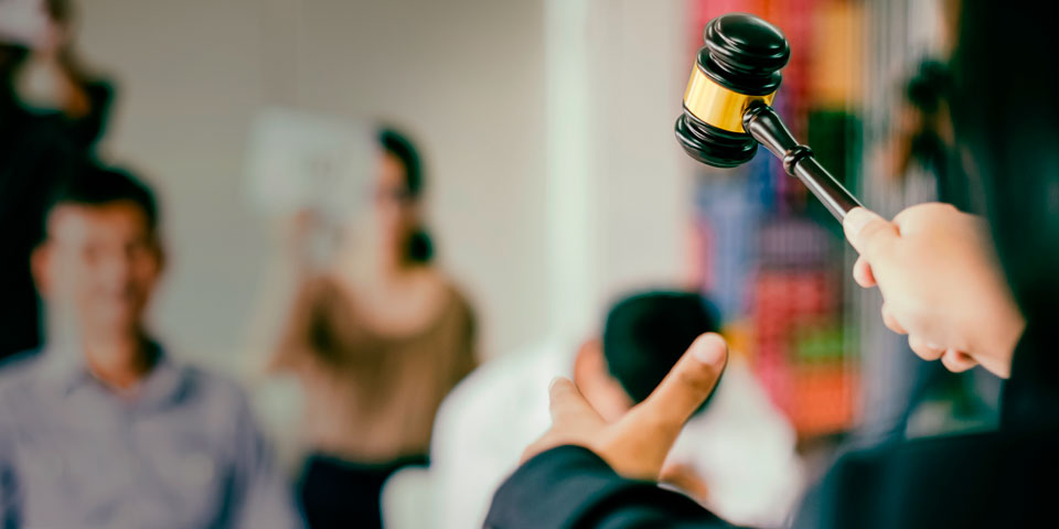 a blurred scene from an auction